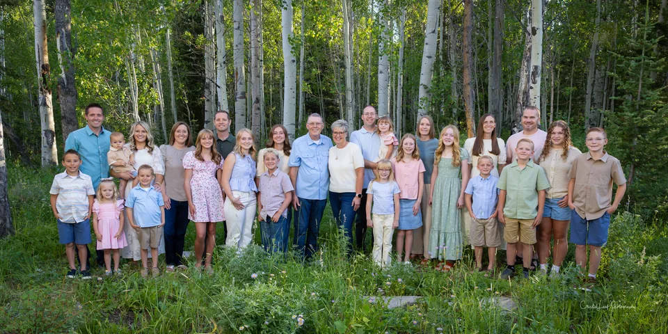A large extended family portrait in an aspen grove by Crystal Leaf Photography
